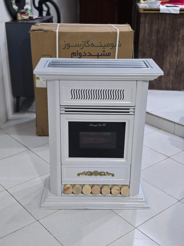 بخاری گازی شومینه 25 هزار شارق توس مدل هیوا